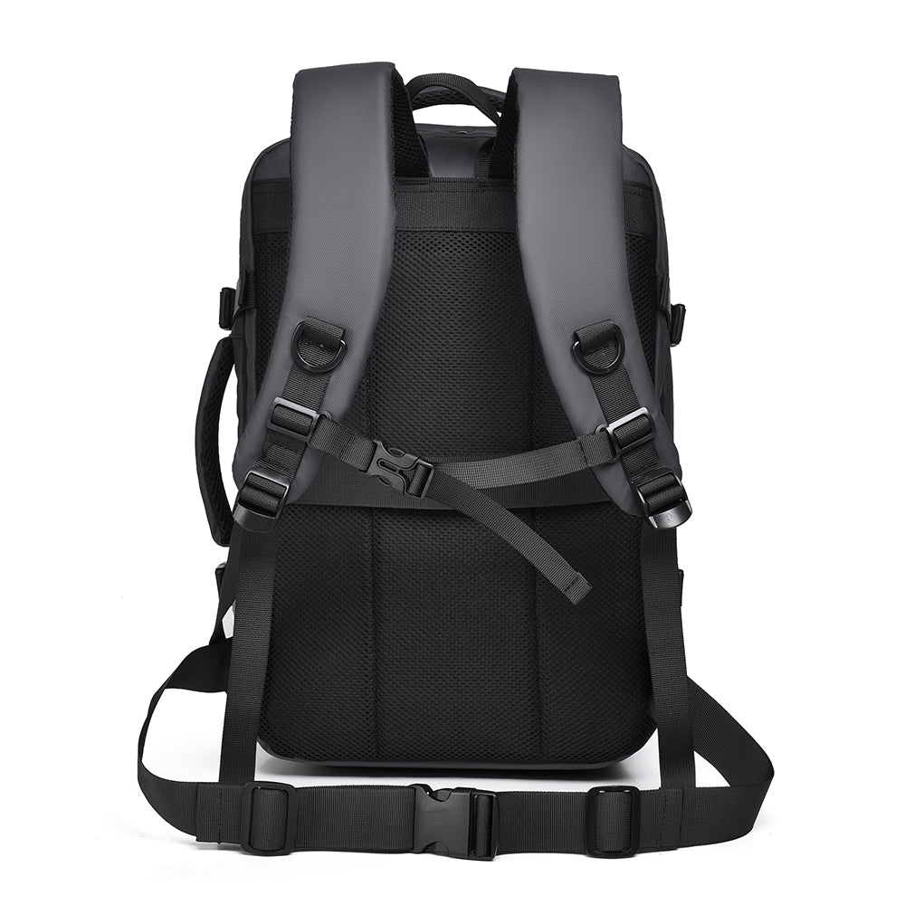 Back panel of the grey travel backpack with padded shoulder straps and luggage strap