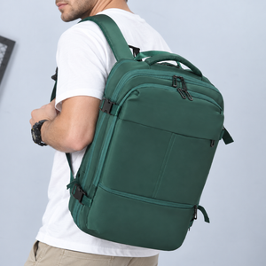 Man carrying the green expandable laptop backpack over one shoulder