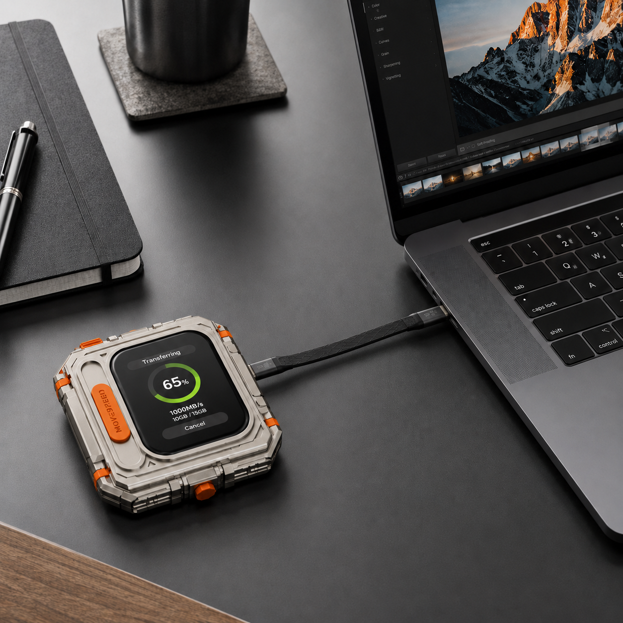 Touchscreen portable SSD connected to a laptop